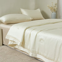 Lily White Tencel™ Jacquard Light Comforter
