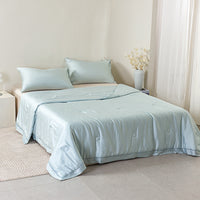 Floating Blue Tencel™ Jacquard Light Comforter