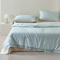 Floating Blue Tencel™ Jacquard Light Comforter