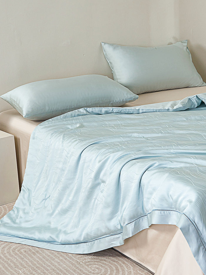 Floating Blue Tencel™ Jacquard Light Comforter