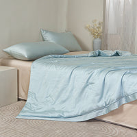 Floating Blue Tencel™ Jacquard Light Comforter