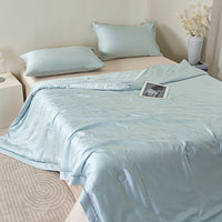 Floating Blue Tencel™ Jacquard Light Comforter