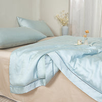 Floating Blue Tencel™ Jacquard Light Comforter